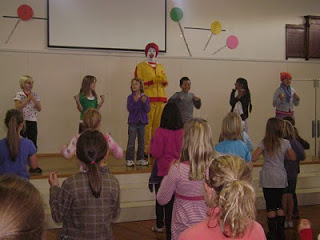 Ronald McDonald in a New Zealand primary school for the 'My Greatest Feat' physical activity promotion
